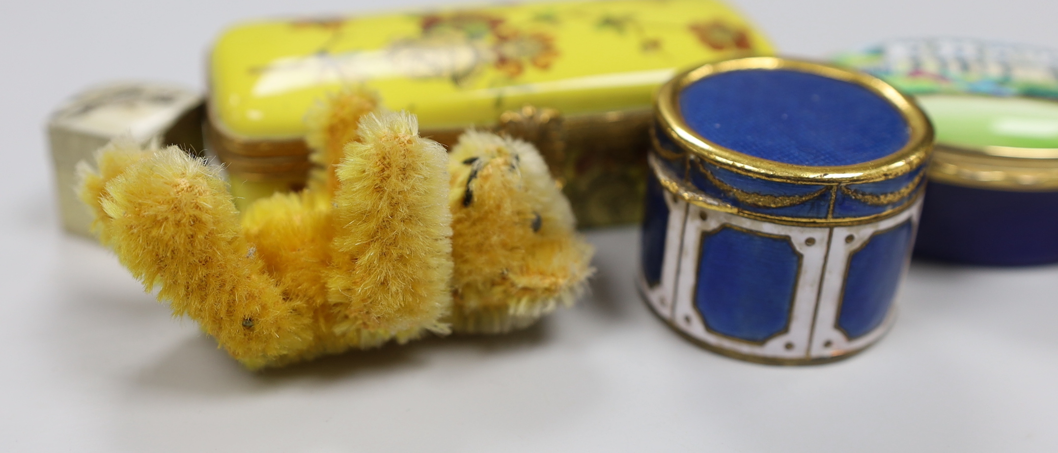 A Schuco miniature bear and various enamel or porcelain trinket boxes